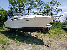 Salvage 1988 Sea Ray 340 Express Cruiser - White Water Craft - Front Three-Quarter View